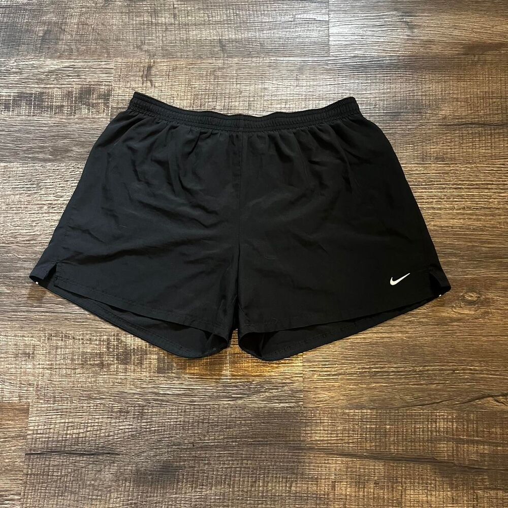Nike Dri-Fit black running shorts with side white stripe and drawstring
